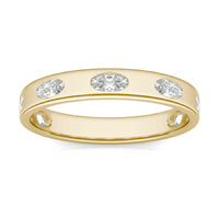 0.70 CTW DEW Oval Forever One Moissanite Bezel Set Seven Stone Ring 14K Yellow Gold